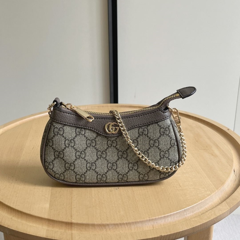 G*u*i top handle bags